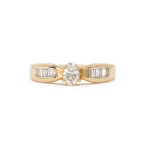 14 Karat Yellow Gold Oval and Baguette Diamond Ring front view